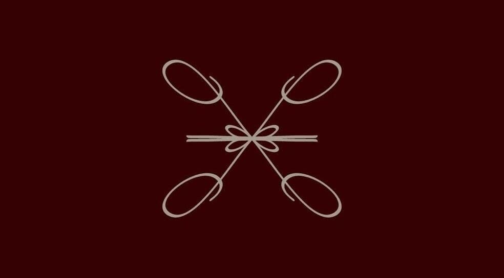 Elegant design at Le Lumiere Spa in SA, featuring intricate, symmetrical patterns on a dark backdrop.