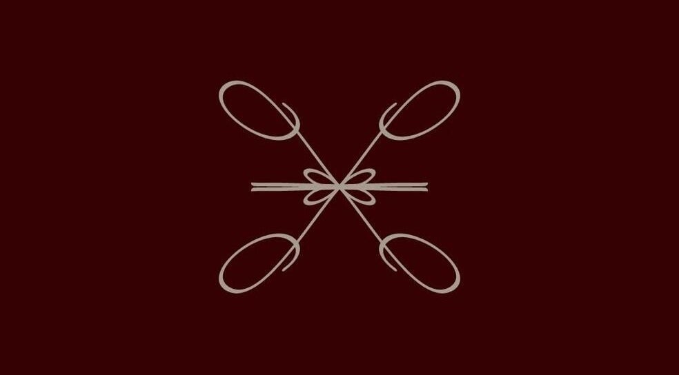 Elegant design at Le Lumiere Spa in SA, featuring intricate, symmetrical patterns on a dark backdrop.