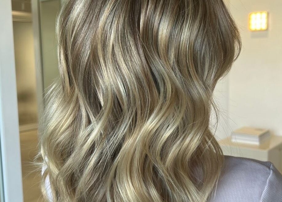 Blonde hair with soft waves at Kove Suite, Innaloo, Western Australia, AU showcasing elegant styling.