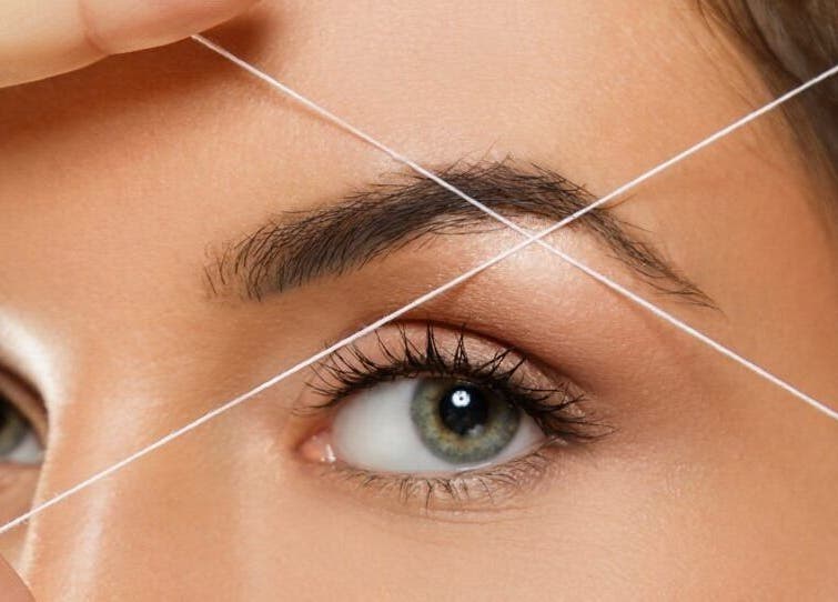 Eyebrow threading at Luxe Aura Beauty & Brows in Melbourne, Victoria, AU for precise, defined brows.
