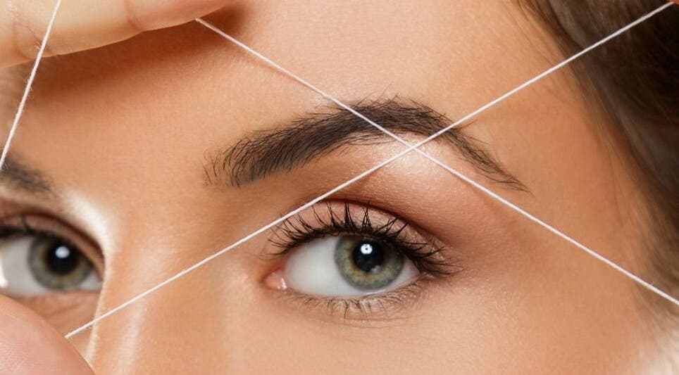 Eyebrow threading at Luxe Aura Beauty & Brows in Melbourne, Victoria, AU for precise, defined brows.