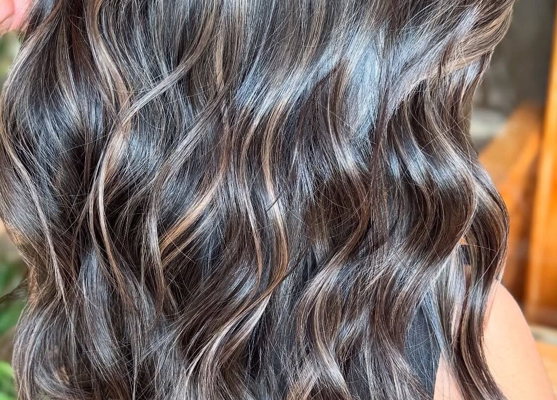 Glossy wavy hair styled at Behind The Chair Salon | Quezon City Branch in Quezon City, Metro Manila, PH.