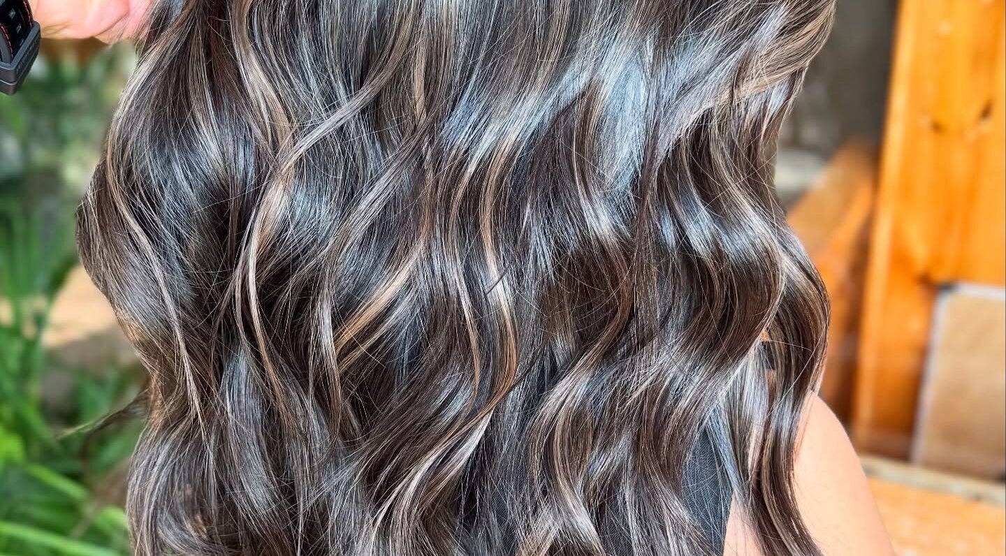 Glossy wavy hair styled at Behind The Chair Salon | Quezon City Branch in Quezon City, Metro Manila, PH.