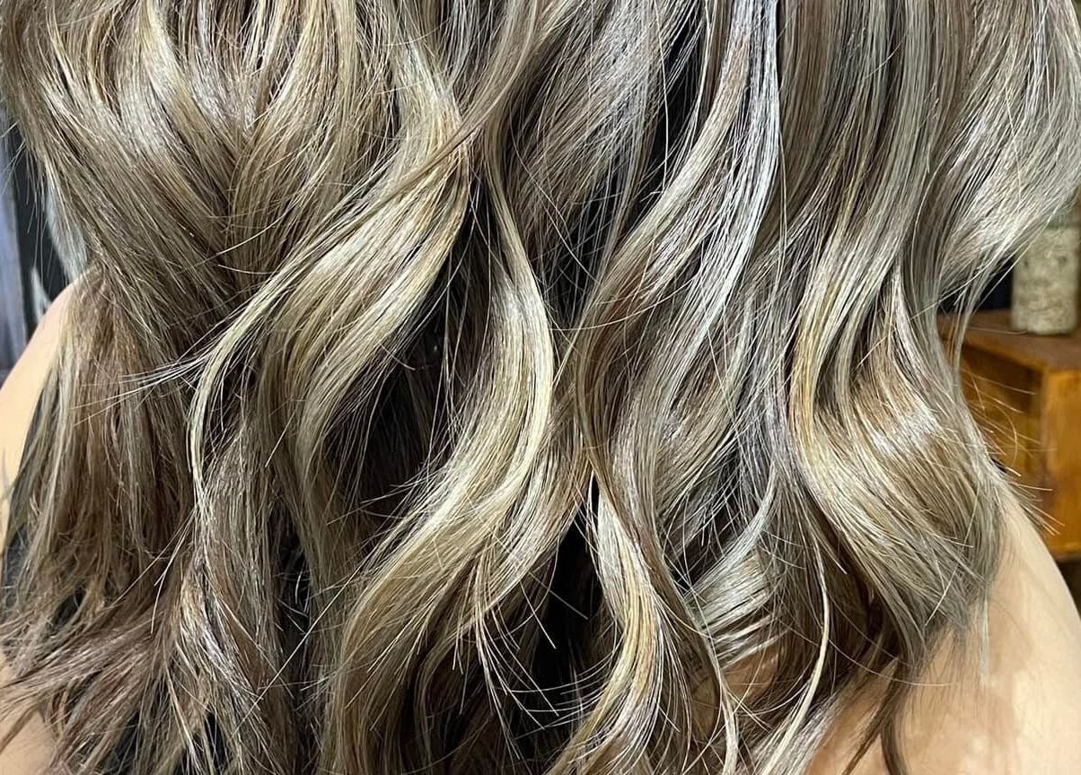 Elegant wavy blonde hair styling at Behind The Chair Salon | Quezon City Branch, Quezon City, Metro Manila, PH.