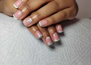 Elegant floral nail art at K.A Beauty in Cape Town, Western Cape, ZA, showcasing a classy finish.