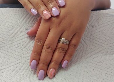 Lavender manicure at K.A Beauty, Cape Town, Western Cape, ZA, showcasing elegant ring and nail art.