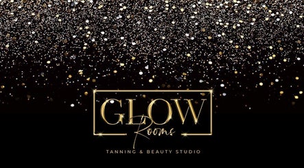 Glow rooms Tanning and beauty studio logo with sparkling golden glitter background, Lancaster, England, GB.