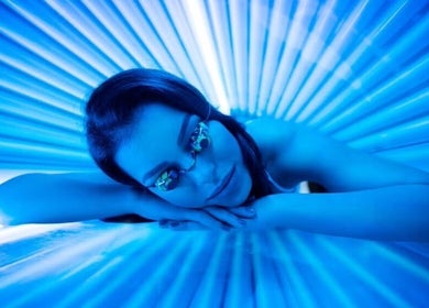 Relaxing in a tanning bed at Glow Rooms Tanning and Beauty Studio, Lancaster, England, GB.