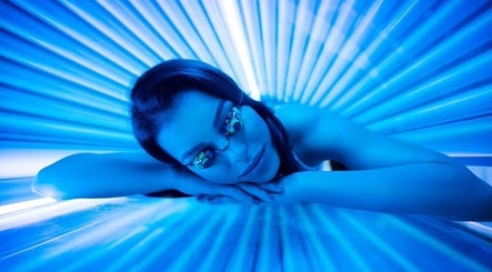 Relaxing in a tanning bed at Glow Rooms Tanning and Beauty Studio, Lancaster, England, GB.