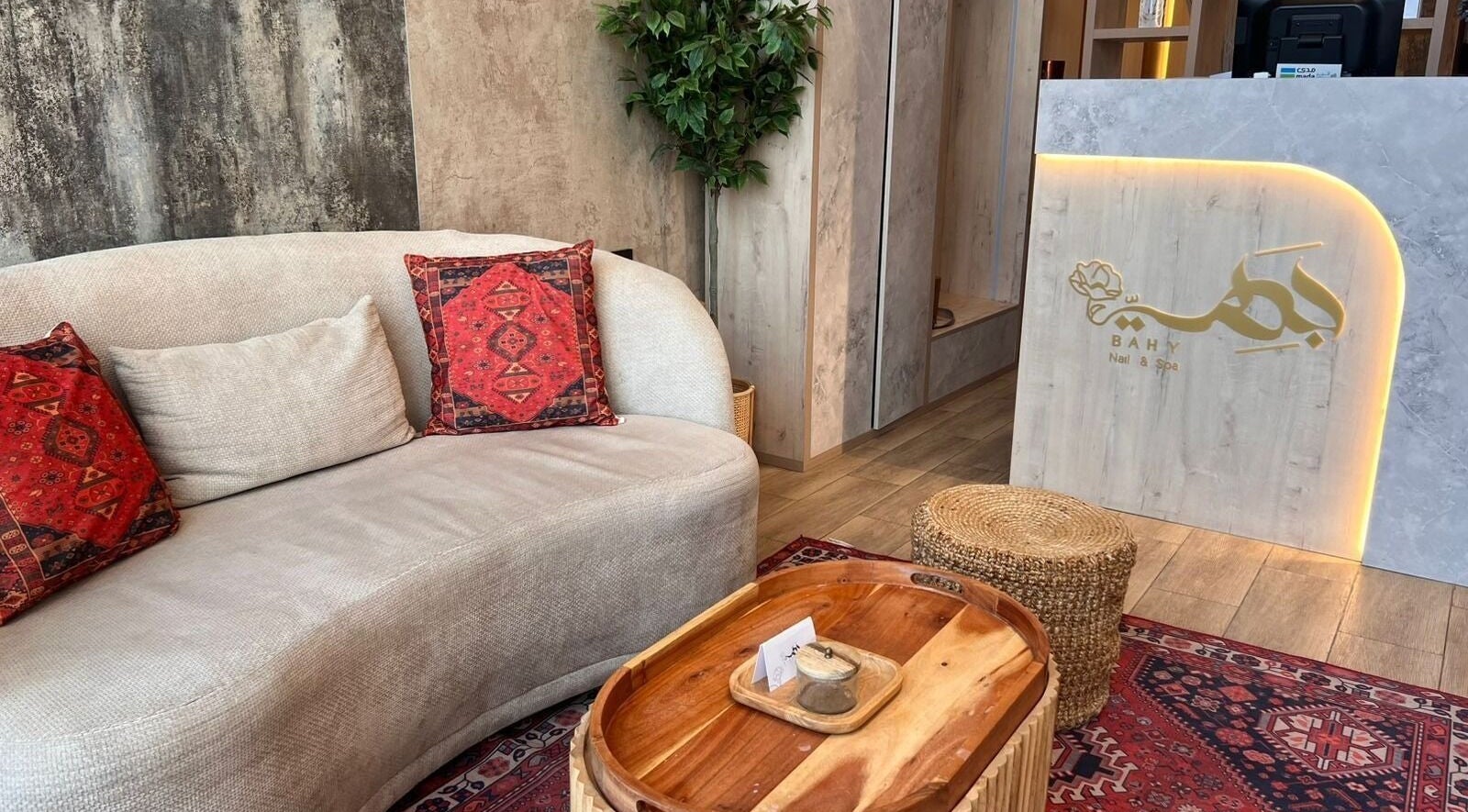 Welcoming entrance at Bahy Spa, Dammam with comfy seating and stylish decor.