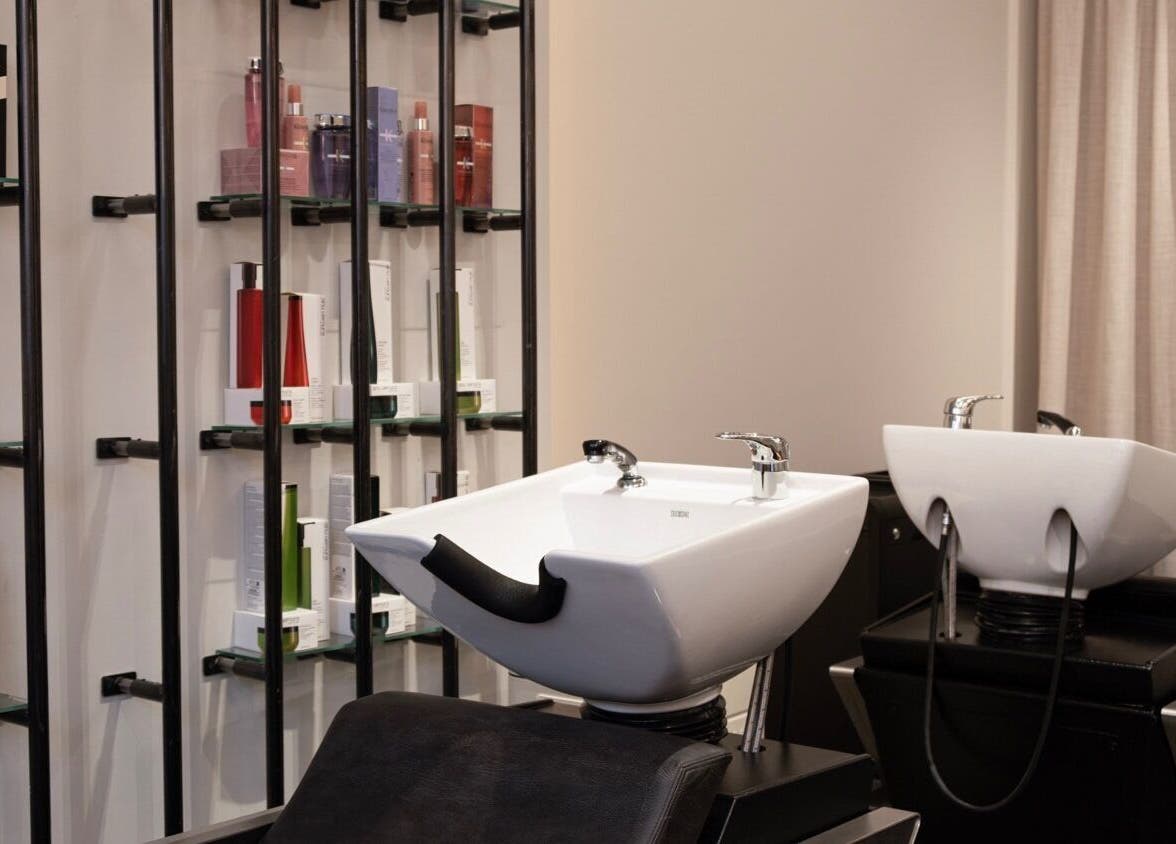 Chic hair wash stations at Sakurami London in London, England, GB, showcasing premium hair products.
