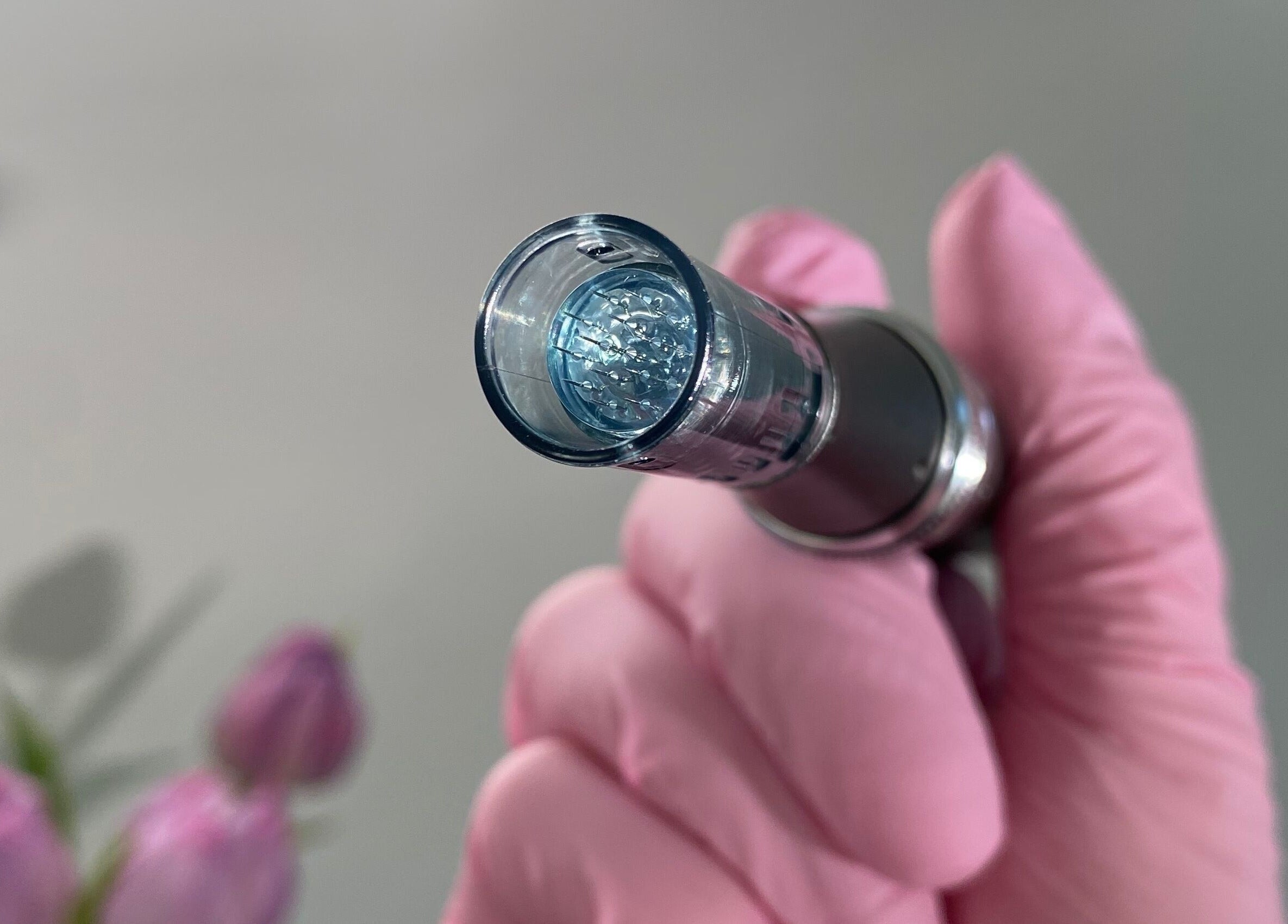 Close-up of a beauty device at Raha Aesthetics, Cardiff, Wales, GB, showcasing precision skincare technology.