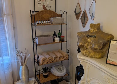 Styled wellness corner at Peach Beauty, London, England, GB, with neatly arranged towels and decor.