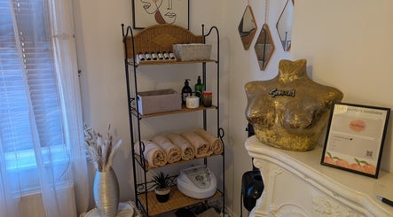 Styled wellness corner at Peach Beauty, London, England, GB, with neatly arranged towels and decor.