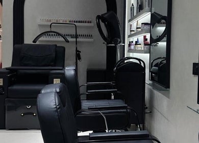 Elegant interior of Velvet Rose Women Salon in Dubai, Dubai, AE showcasing luxury salon chairs and products.