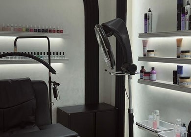 Modern treatment area at Velvet Rose Women Salon in Dubai, Dubai, AE, showcasing beauty products and equipment.