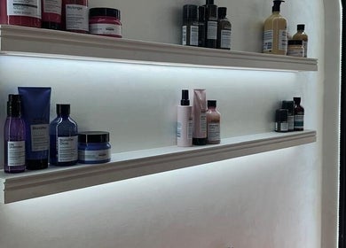 Luxury hair products on shelves at Velvet Rose Women Salon, Dubai, Dubai, AE.