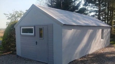 Tranquil exterior of Recovery Massage Therapy in Omagh, Northern Ireland, GB, surrounded by serene trees.