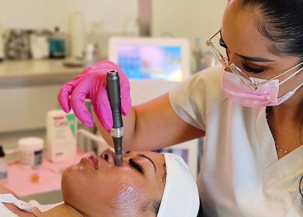 Beauty professional performs facial at Lux Beauty Clinic, Paramaribo, Paramaribo, SR.