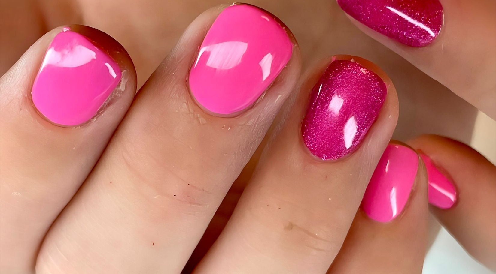 Bright pink nails showcasing artistic design at Sylwia Nails & Beauty, Cork, County Cork, IE.