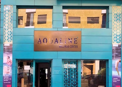 Entrance of Aqualine Wellness Center, a turquoise facade in Marrakesh, Marrakesh-safi, MA.