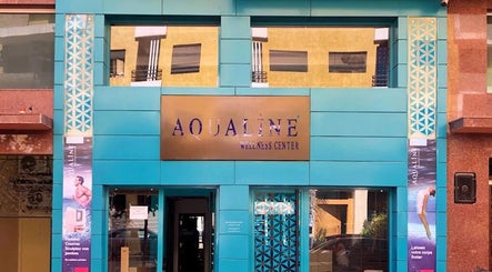 Entrance of Aqualine Wellness Center, a turquoise facade in Marrakesh, Marrakesh-safi, MA.