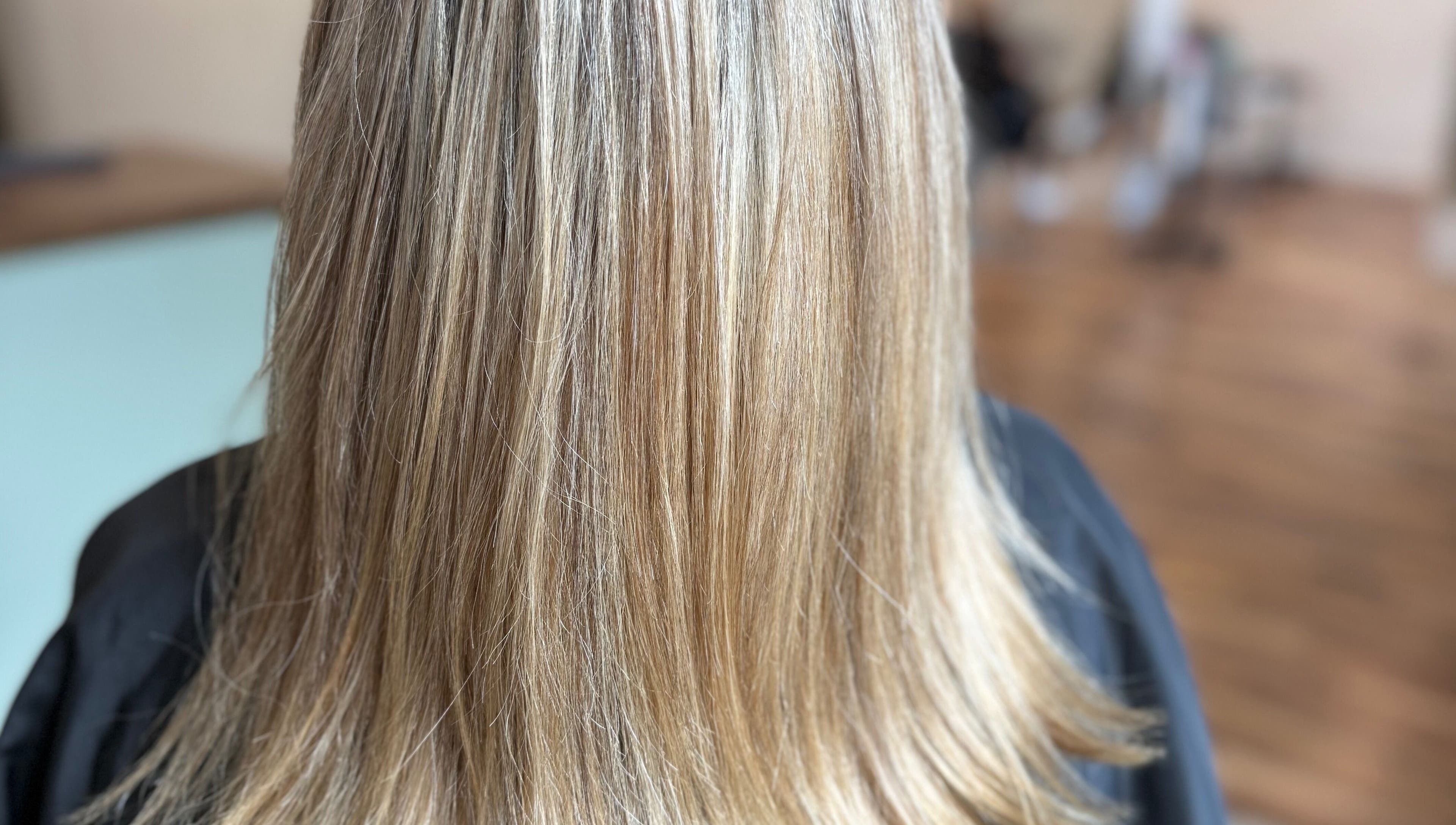 Silky smooth blonde hair at Hair To A T By Tee in Arnoldsville, Georgia, US.