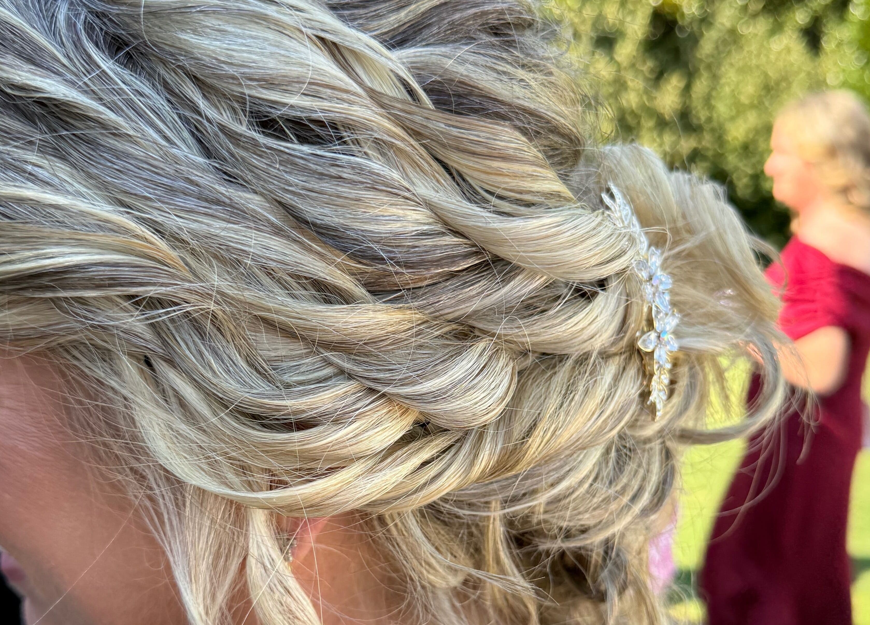 Beautiful updo hairstyle with blonde highlights at Hair To A T By Tee, Arnoldsville, Georgia, US.