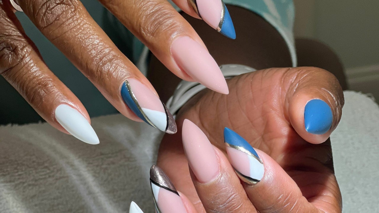 Woman receive care service by professional Beautician Manicure at spa  centre. Nail beauty salon use nail file for Glazing treatment. manicurist  make nail customer to beautiful. body care spa treatment 33266759 Stock