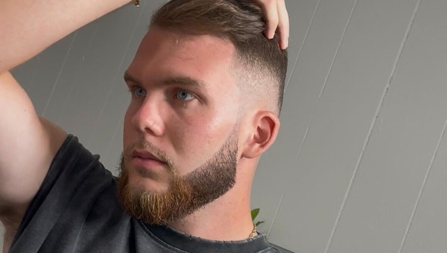 Man with stylish haircut at Sacred Diamond Lifestyle Club, Nashville, Tennessee, US.
