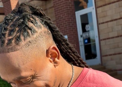 Elegant braided hairstyle at Sacred Diamond Lifestyle Club, Nashville, Tennessee, US.