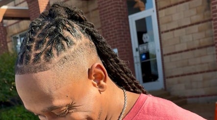 Elegant braided hairstyle at Sacred Diamond Lifestyle Club, Nashville, Tennessee, US.