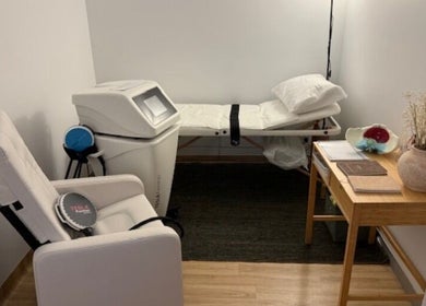 Think2be Healthy therapy room at North Lakes, Queensland, AU with cozy chairs and modern equipment.