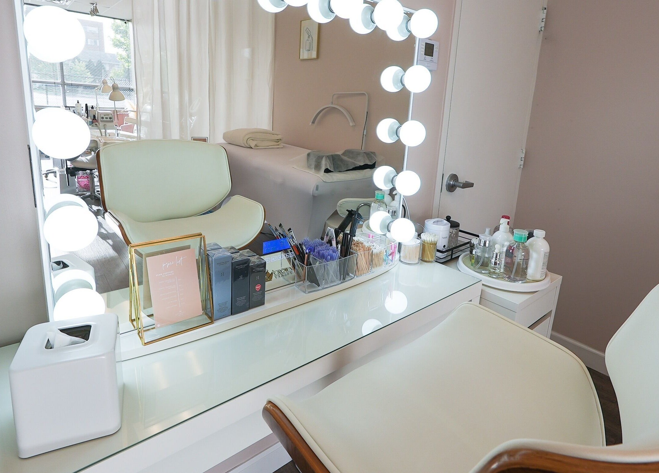 Elegant makeup vanity at Kvadrat Room in Des Plaines, Illinois, US, showcasing a chic and modern beauty setup.