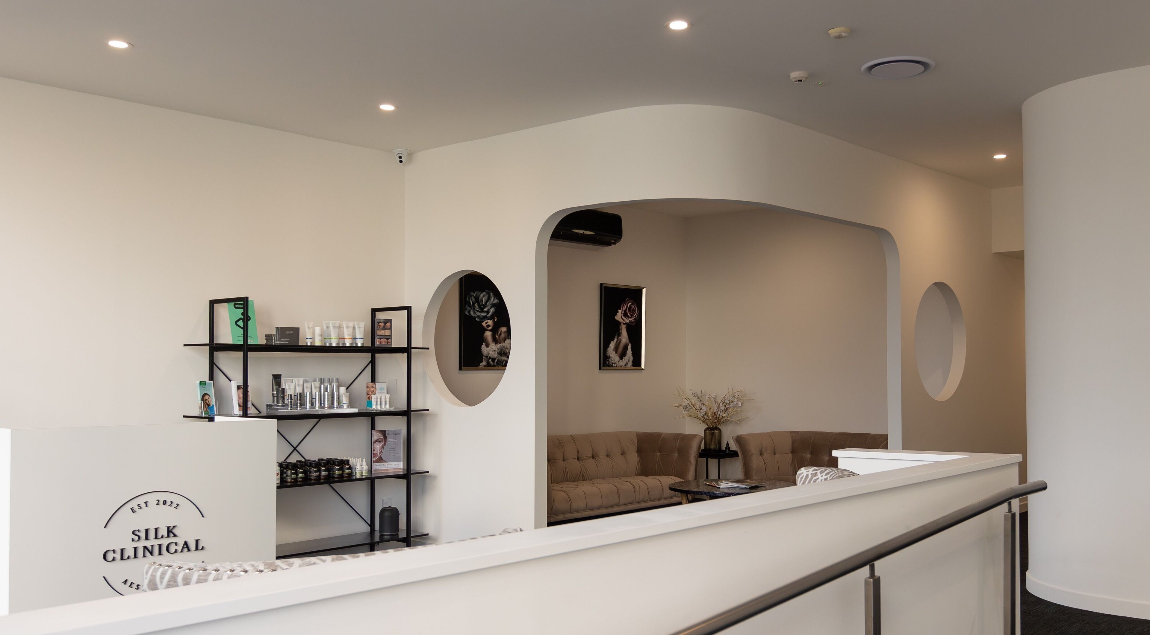 Modern interior of Silk Clinical Aesthetics, Tuakau, Waikato Region, NZ. Features stylish decor and inviting seating.