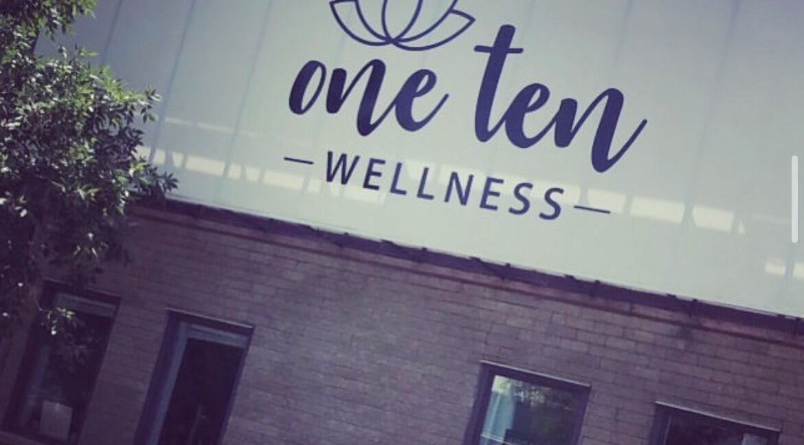 Facade of One Ten Wellness with lotus logo in Melita, Manitoba, CA.