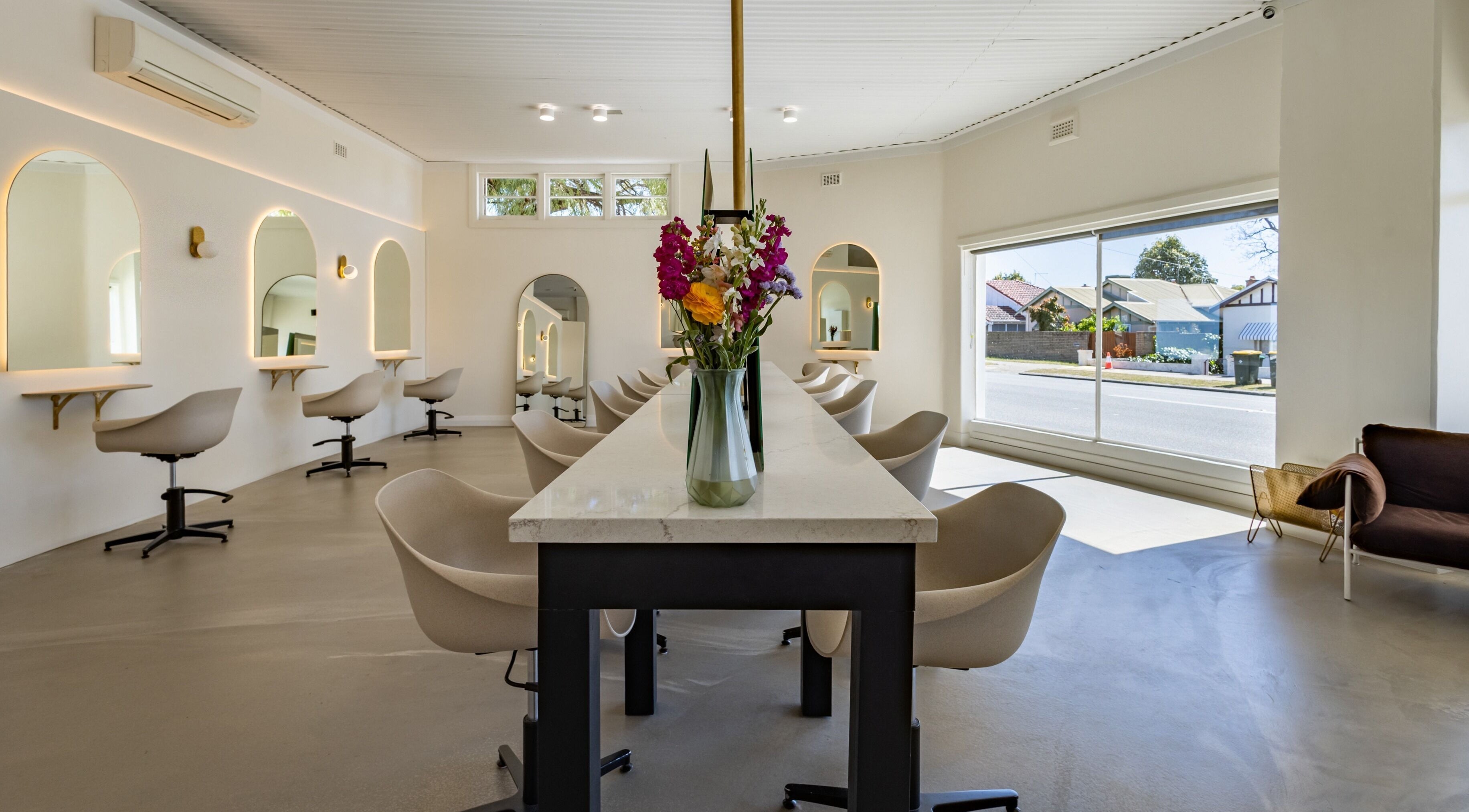 Interior of Winter Grace Hair Artistry in Perth, Western Australia, AU featuring elegant styling stations.