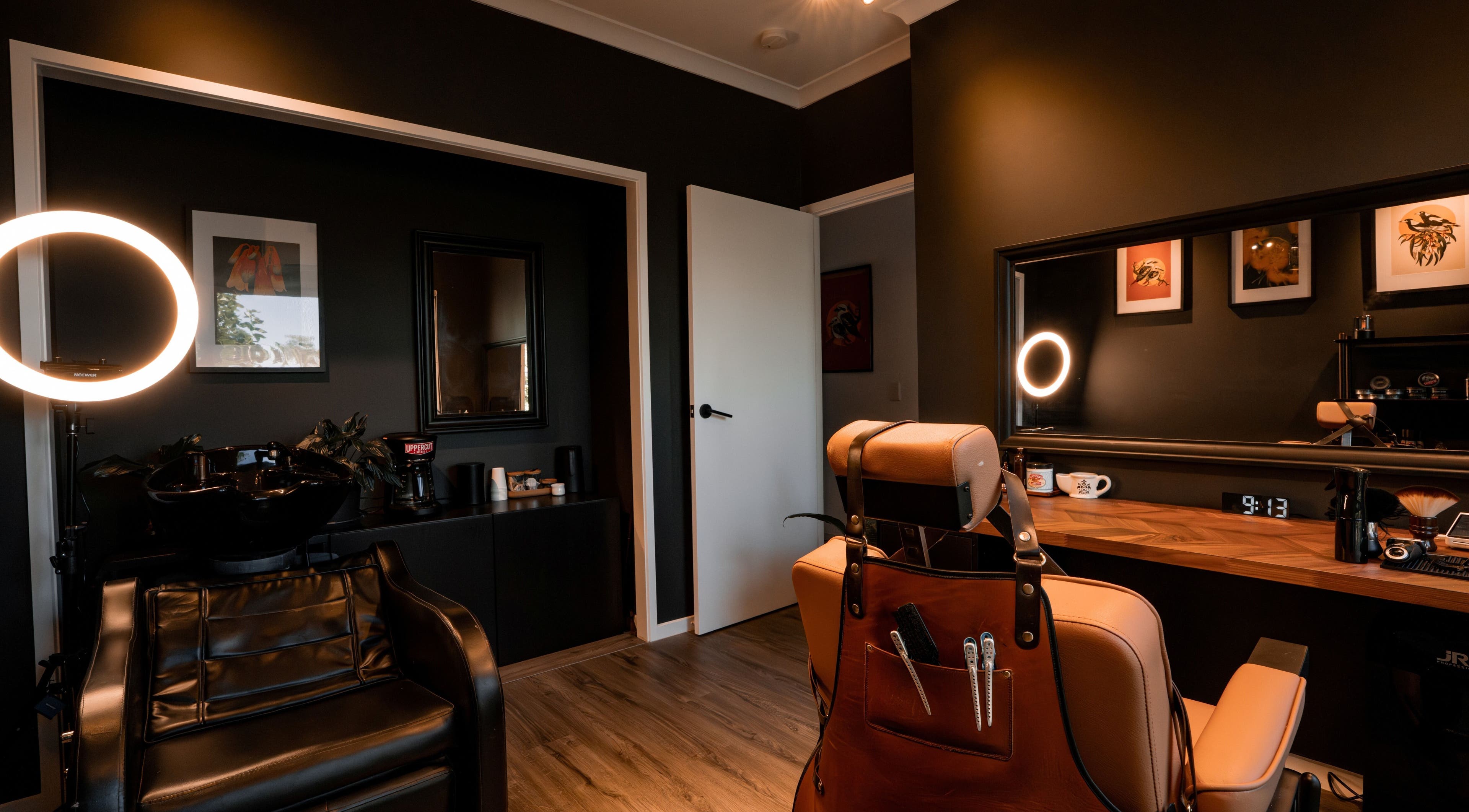 Modern salon interior with chic barber chair at Caleb Sweeney Barber, Nirimba, Queensland, AU.