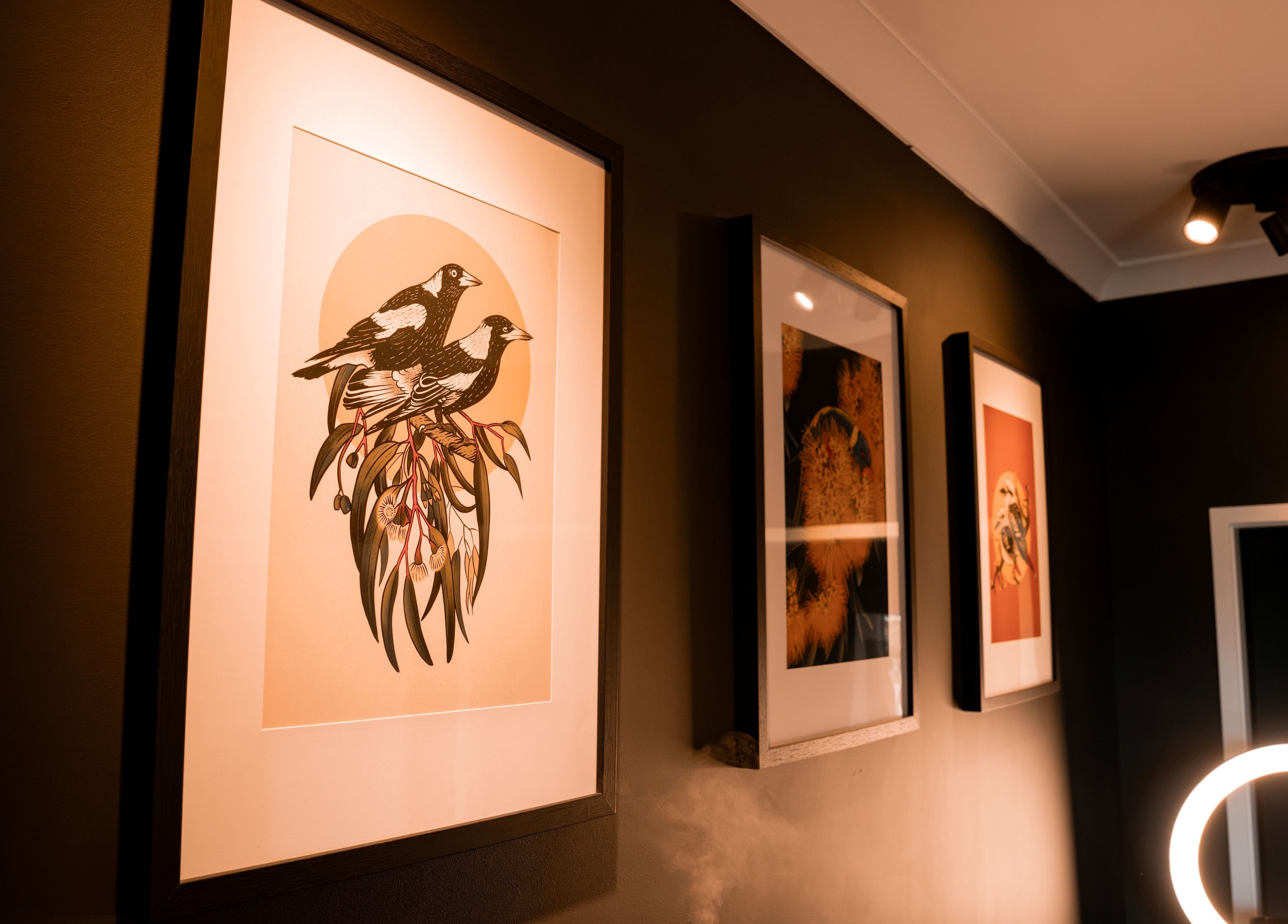 Stylish artwork decorates the walls of Caleb Sweeney Barber in Nirimba, Queensland, AU, enhancing ambiance.