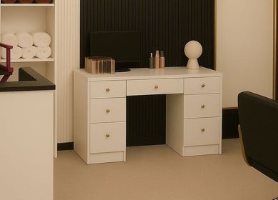 Modern salon desk at Katherine Mendoza Beauty Salon in Surrey, British Columbia, CA, showcasing minimalistic design.