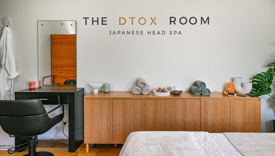 Serene spa setting at The Dtox Room, Melbourne, Victoria, AU with towels and decor enhancing the relaxing ambiance.