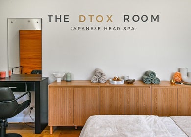 Serene spa setting at The Dtox Room, Melbourne, Victoria, AU with towels and decor enhancing the relaxing ambiance.
