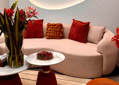 Elegant waiting area at Hairkunst Hijabis Luxe, Bandar Baru Bangi, Selangor, MY with plush decor and vibrant flowers.