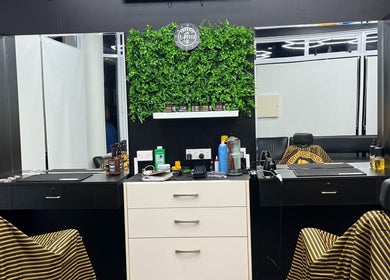 Modern barber station at Francis T Cuttz, Auckland, Auckland, NZ, featuring stylish decor and grooming products.