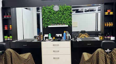 Modern barber station at Francis T Cuttz, Auckland, Auckland, NZ, featuring stylish decor and grooming products.