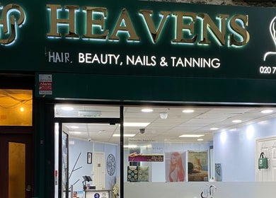 Front view of Heavens Salon in London, England, GB showcasing beauty services signage.
