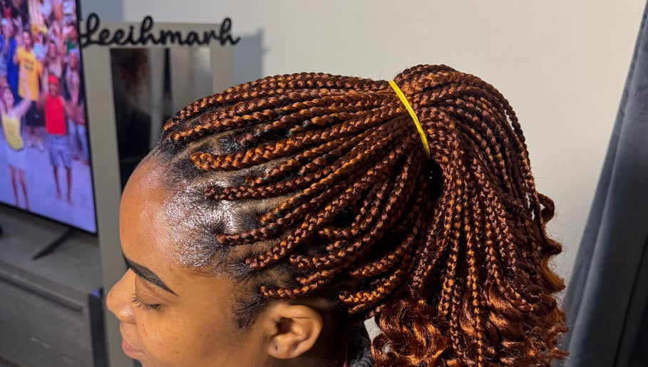 Intricate braided hairstyle at Leeihmarh, Plymouth, England, GB salon, showcasing expert styling.