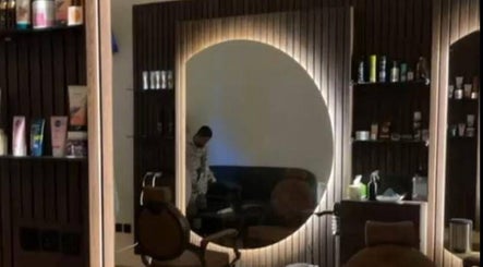 Modern barber chair and products at Razor Origin Barbershop, Buqayq, Eastern Province, SA.