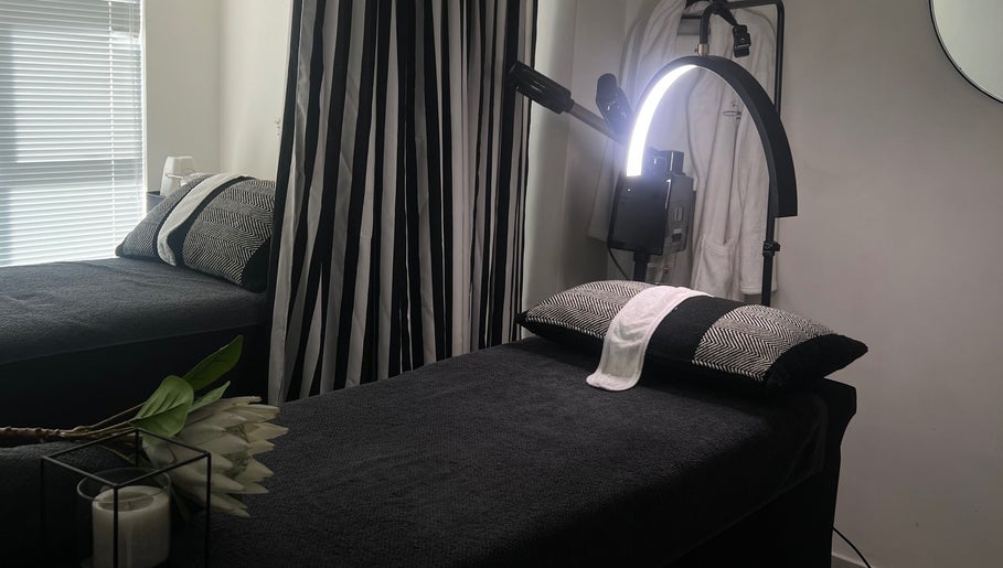 Relaxing spa treatment room at Saseka Co., Pretoria, Gauteng, ZA with a massage bed and ambient lighting.