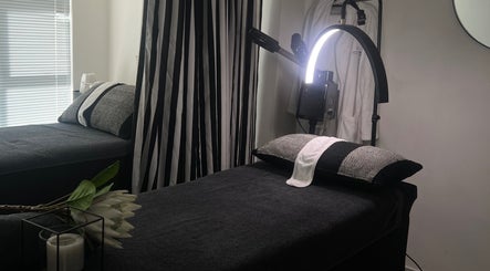 Relaxing spa treatment room at Saseka Co., Pretoria, Gauteng, ZA with a massage bed and ambient lighting.